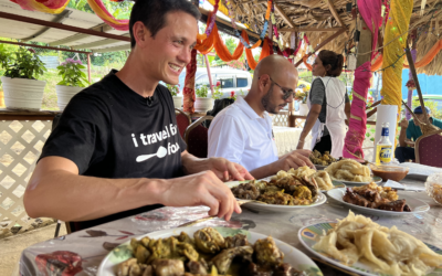 Mark Wiens in Trinidad with Foodie Tales with Zaak enjoying food at Aunty Doll's in Fyzabad